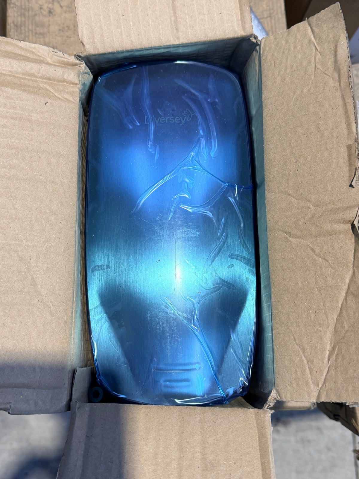 Brightwell Mercury soap dispenser in its box with protective film – actual stock