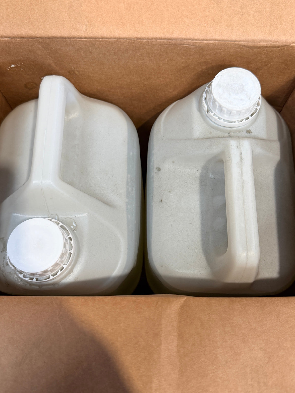 Two sealed 5L canisters of 1H Alu Safe in the case – actual stock