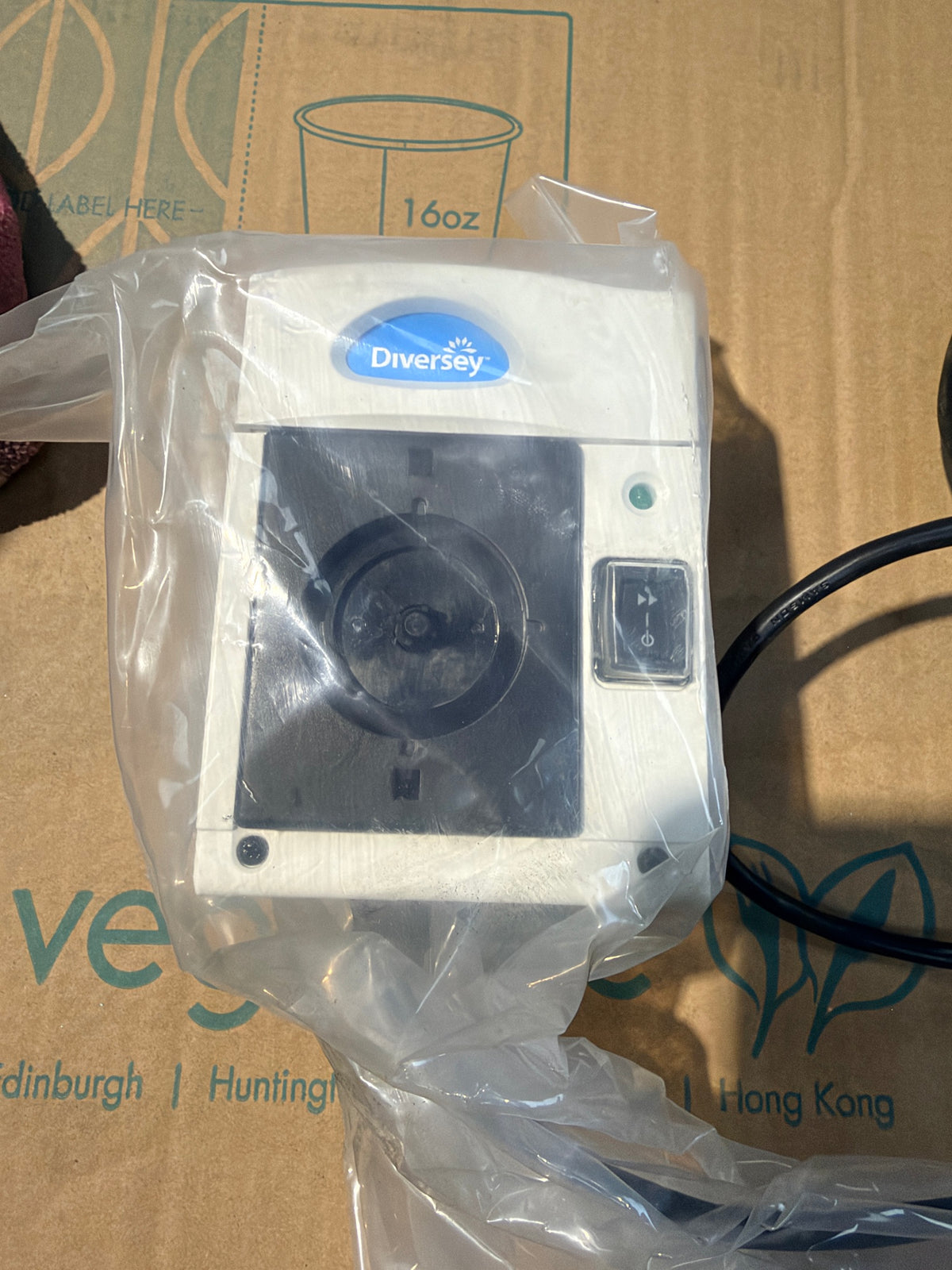 Diversey D250 dosing pump front – pump head and switch