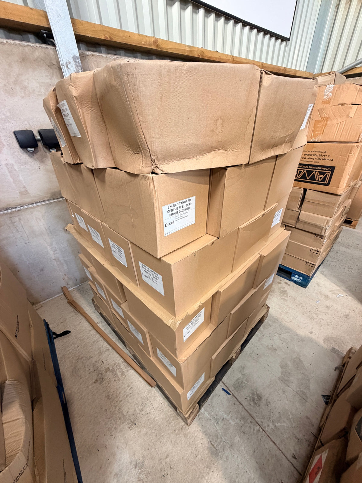 Pallet of boxed Excel Standard Centre Feed dispensers – actual stock