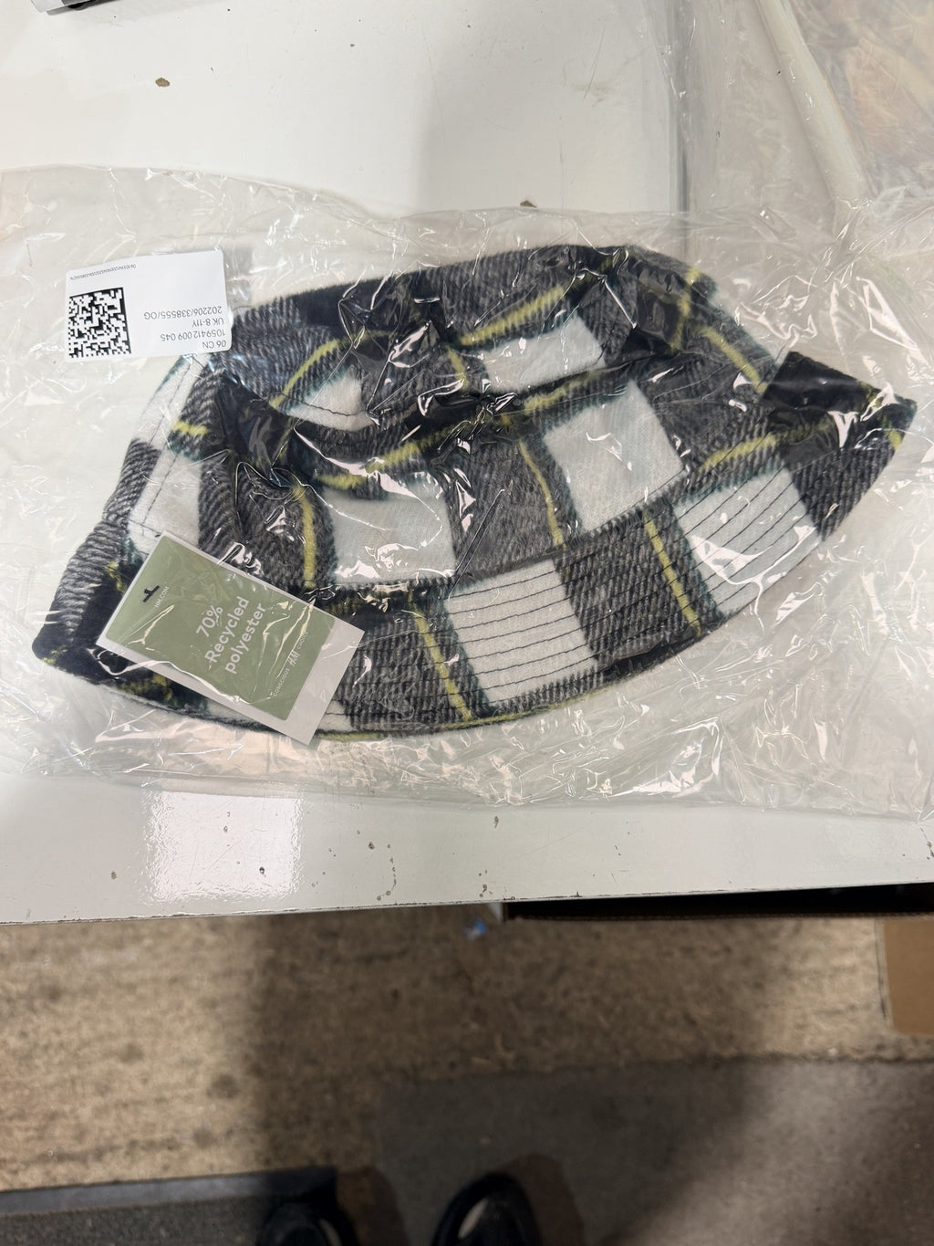 H&M kids' checked bucket hat sealed in its original bag with swing tag – actual stock