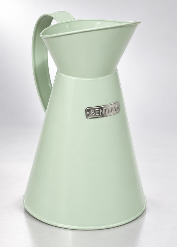 Charles Bentley heritage metal jug in pale sage green, studio photo