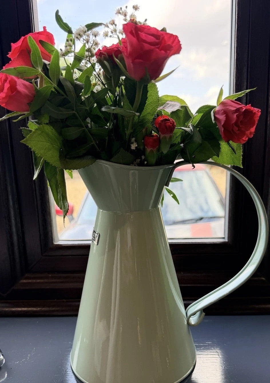 Charles Bentley heritage jug used as a flower vase with roses