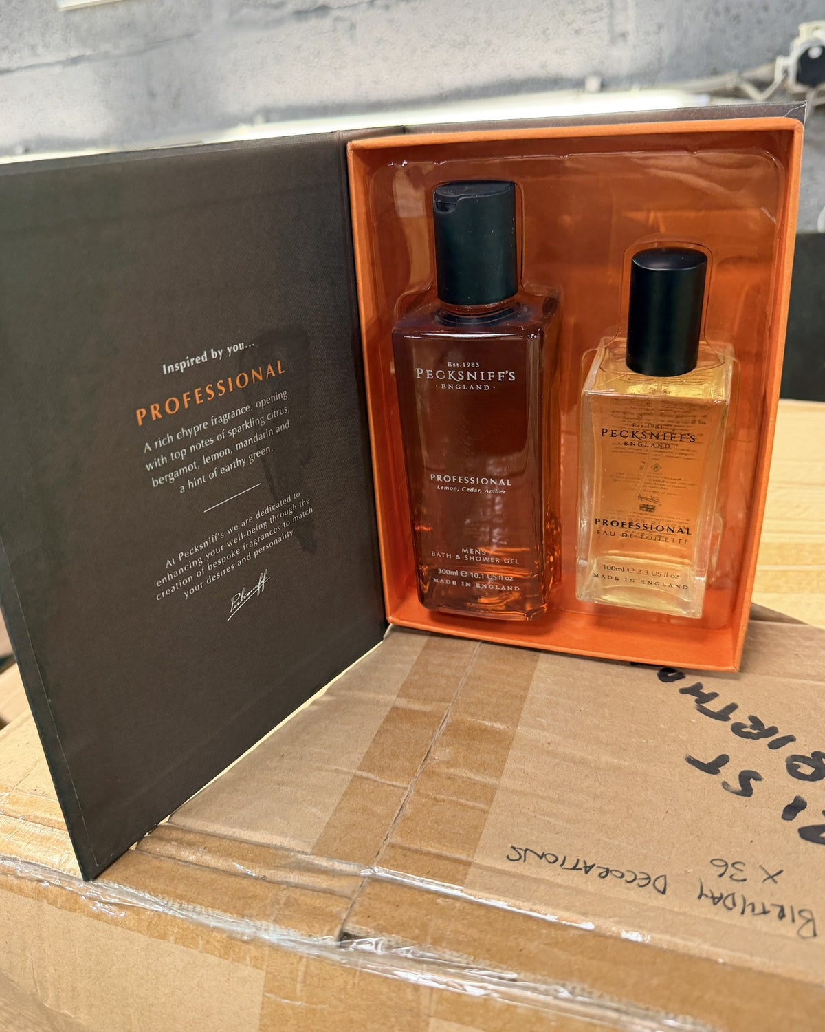 Gift set open showing 300ml bath and shower gel and 100ml eau de toilette – real photo of stock