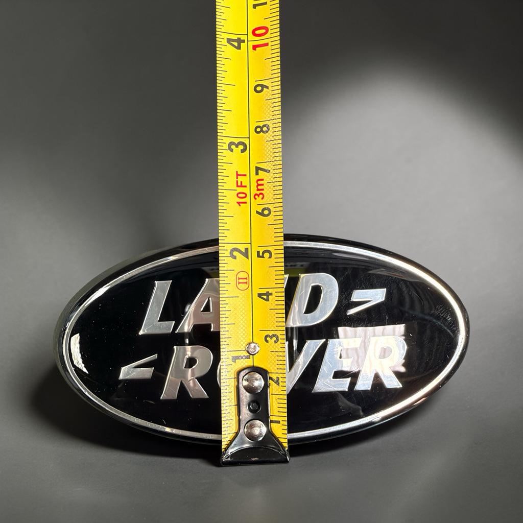 Land Rover oval badge height measured at approx 53 mm