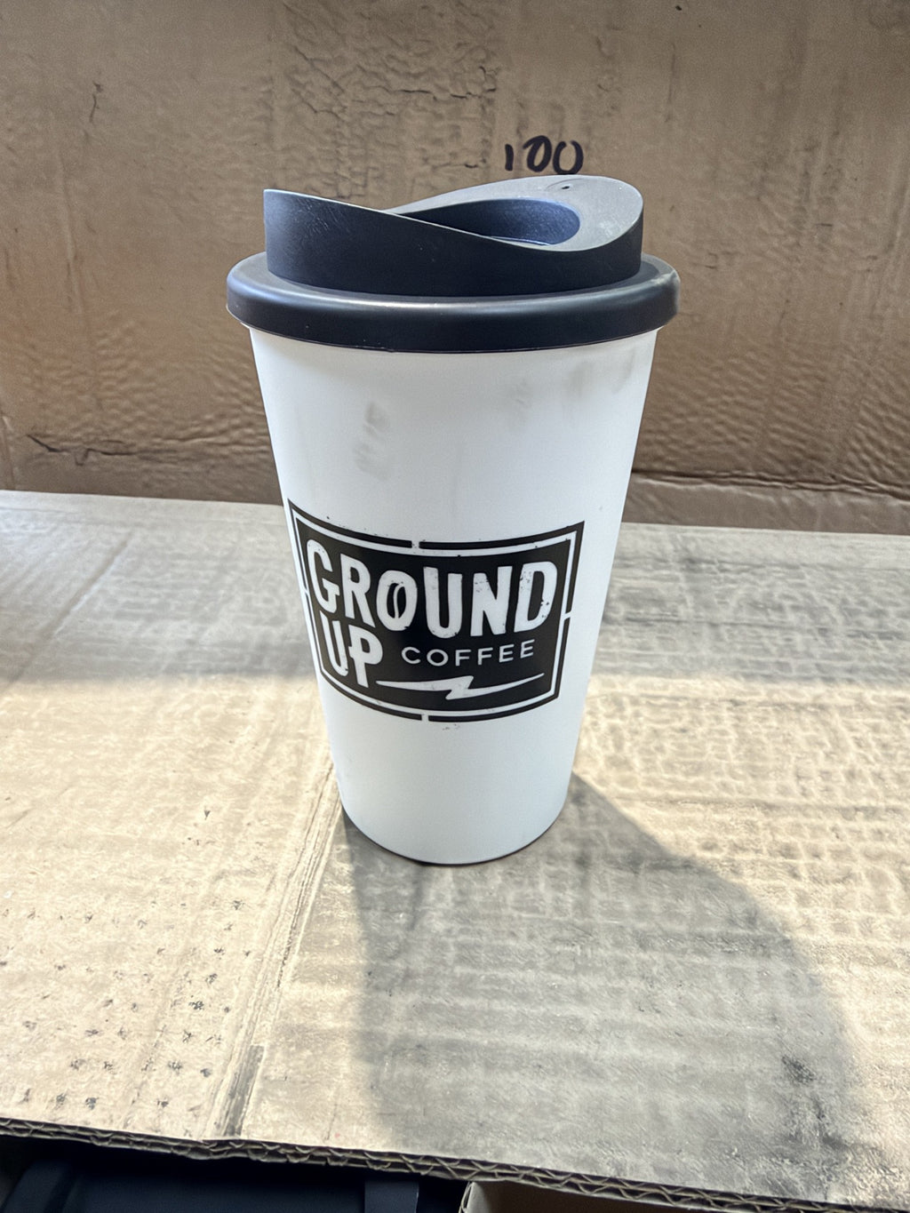 Ground Up Coffee Branded Reusable Travel Cups with Lids – actual stock photo 1