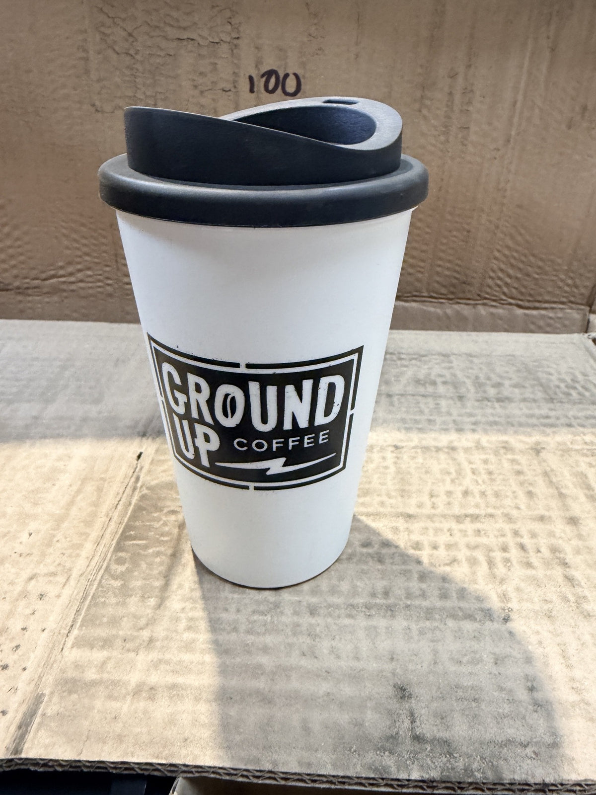 Ground Up Coffee Branded Reusable Travel Cups with Lids – actual stock photo 2