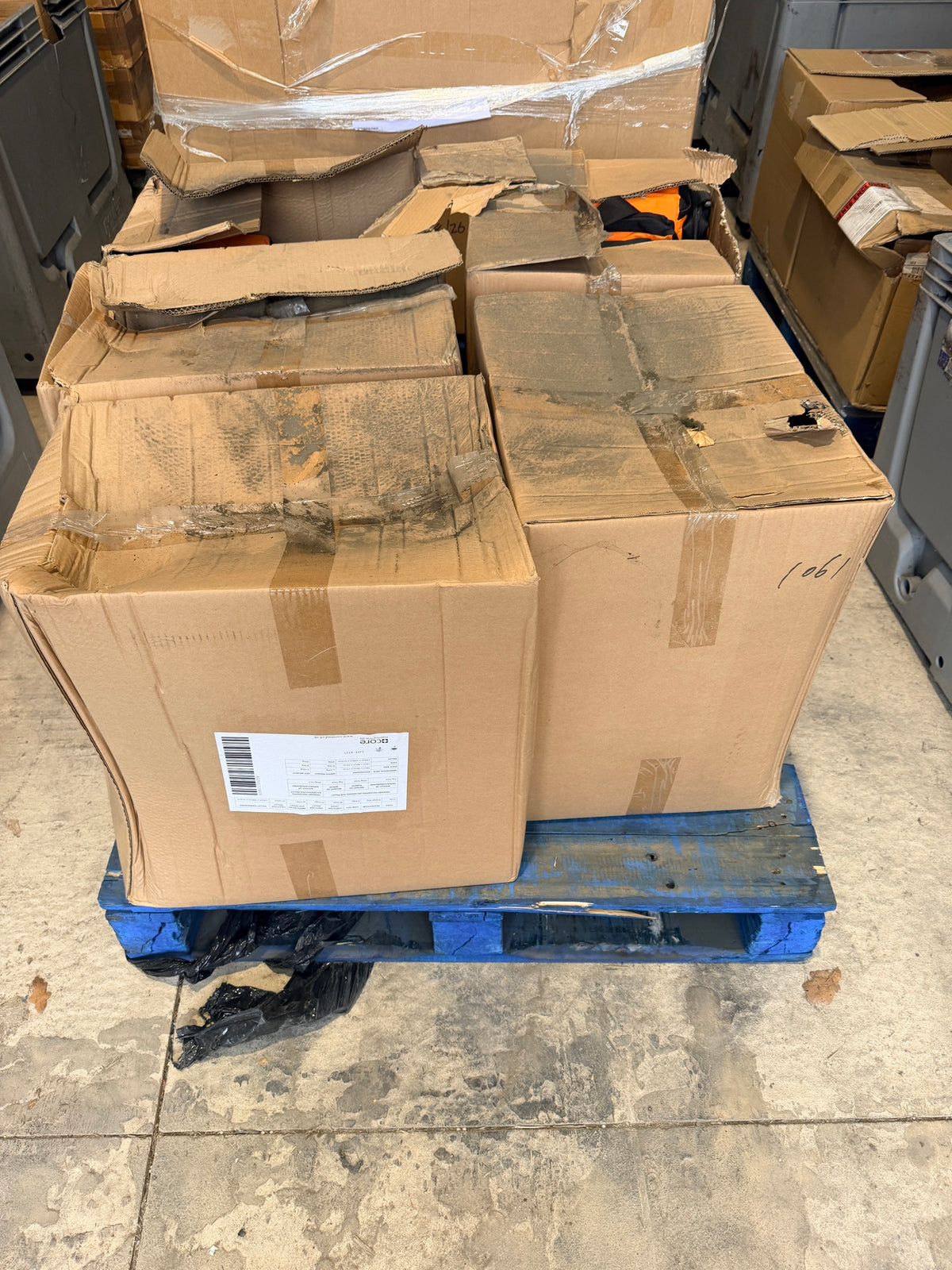 Cases of bags on the pallet – outer cartons damp-marked and torn