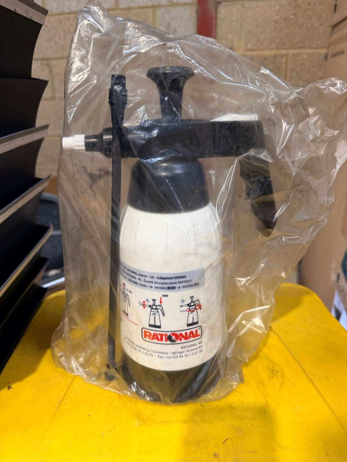 Rational 6004.0100 handheld pressure sprayer in its bag