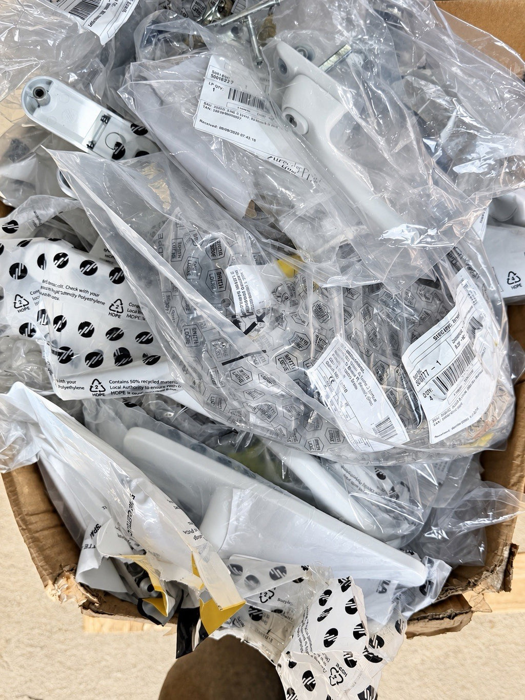 Pallet of window and door hardware photo 5