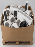 Box pallet of loose heaters sold as spares or repairs – studio image