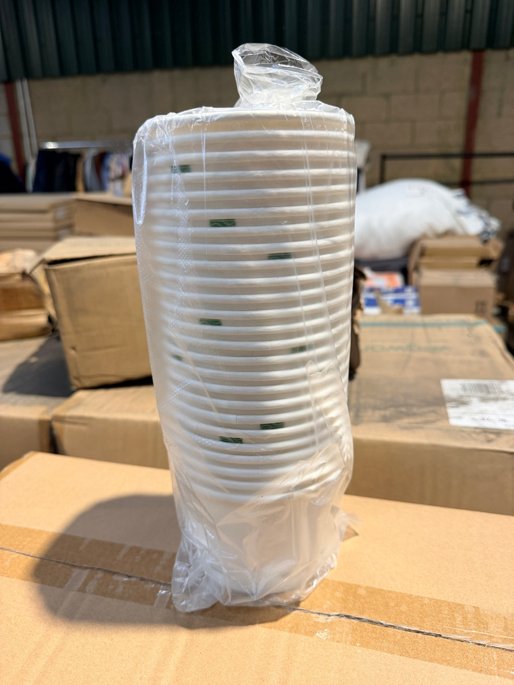 Sealed pack of 25 Vegware 16oz white soup containers with green band